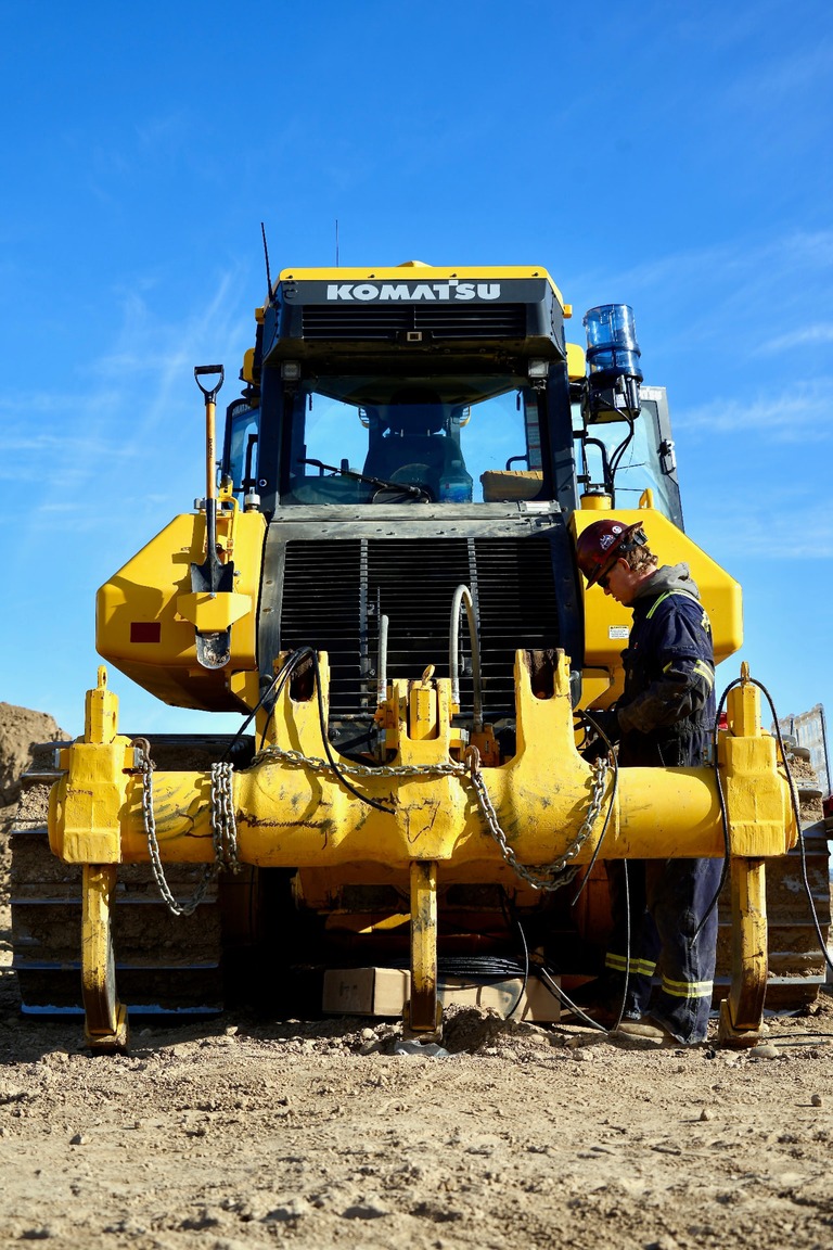 Close-up of heavy equipment pins and bushings